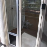 Pet Door panel for sliding screen door