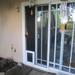 Pet Door panel for sliding screen door