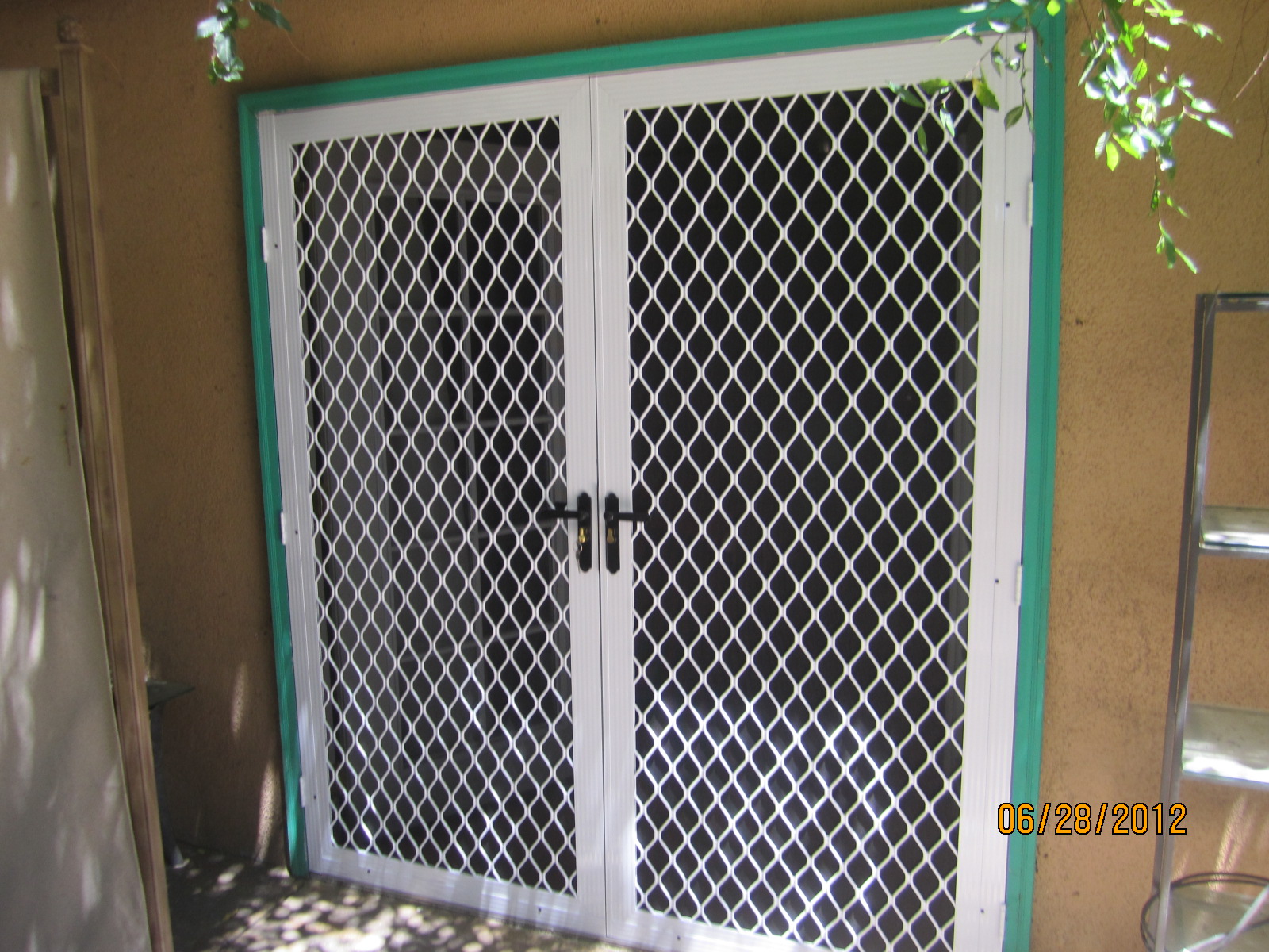 Double Set Of Security Screen Doors In Northridge Retractable